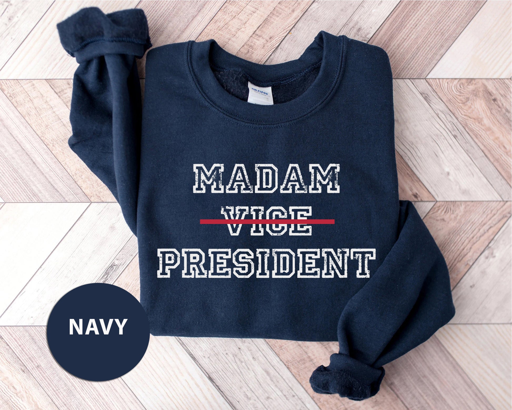 a navy sweatshirt with the words madam vice president on it