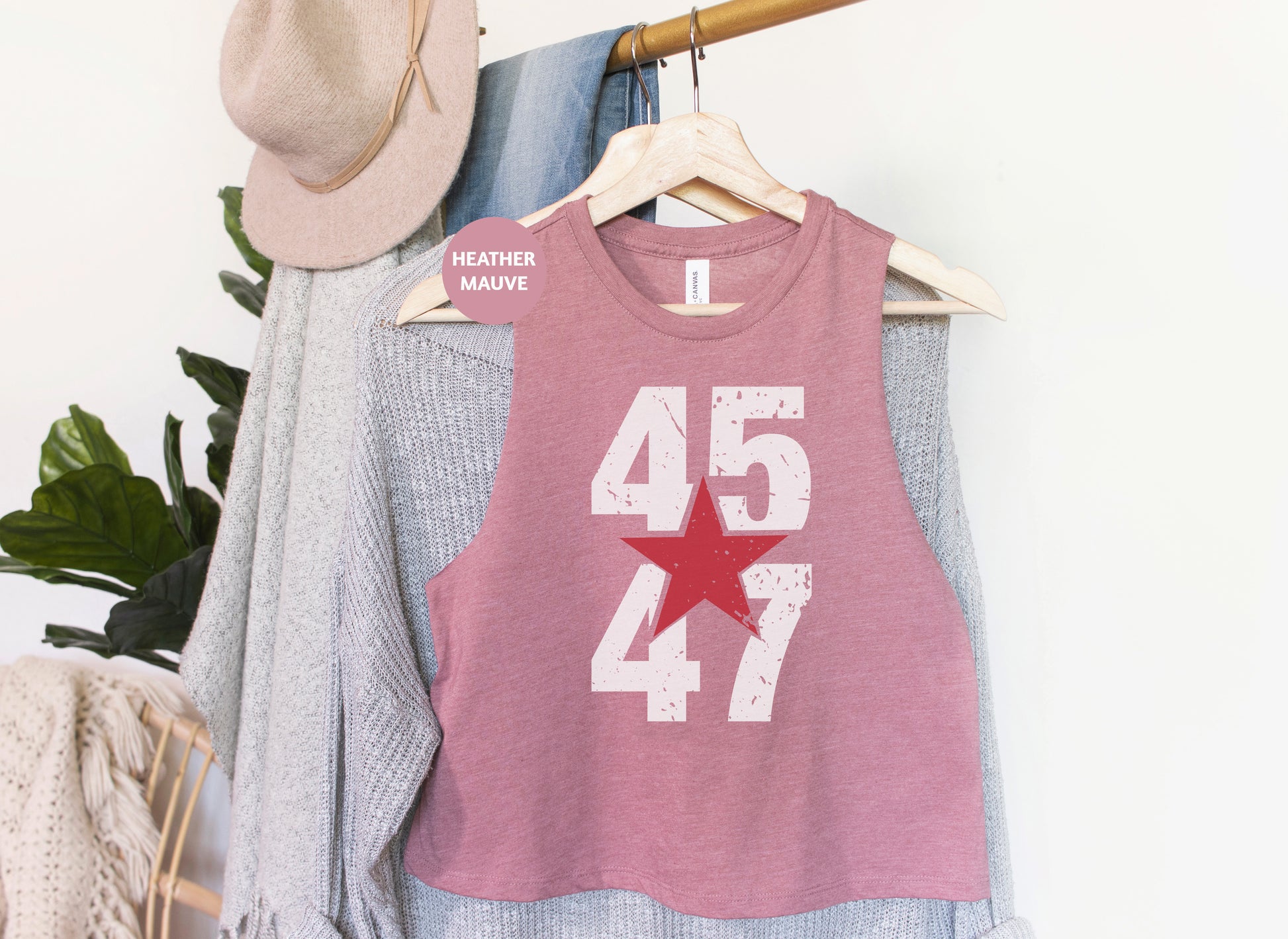 a pink tank top with the number forty four on it