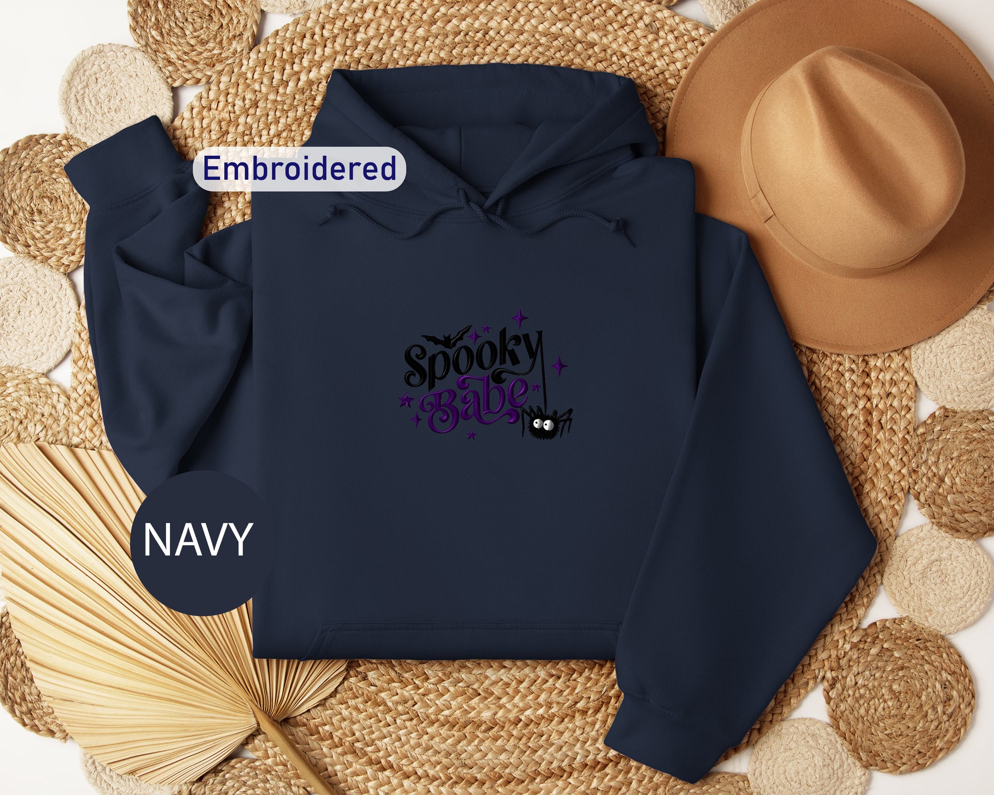 a navy blue hoodie with the words spooky girl on it