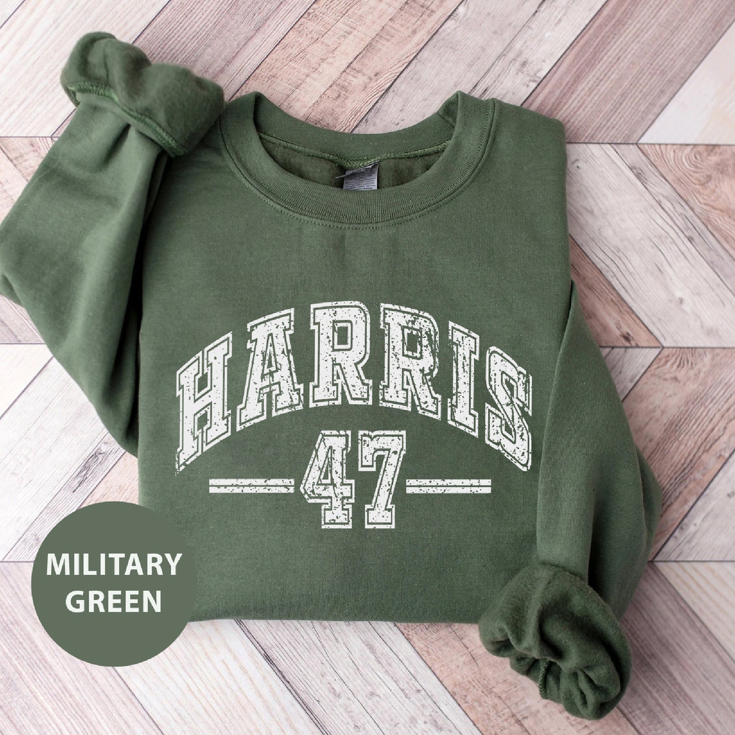 a green sweatshirt with the words harris 47 printed on it