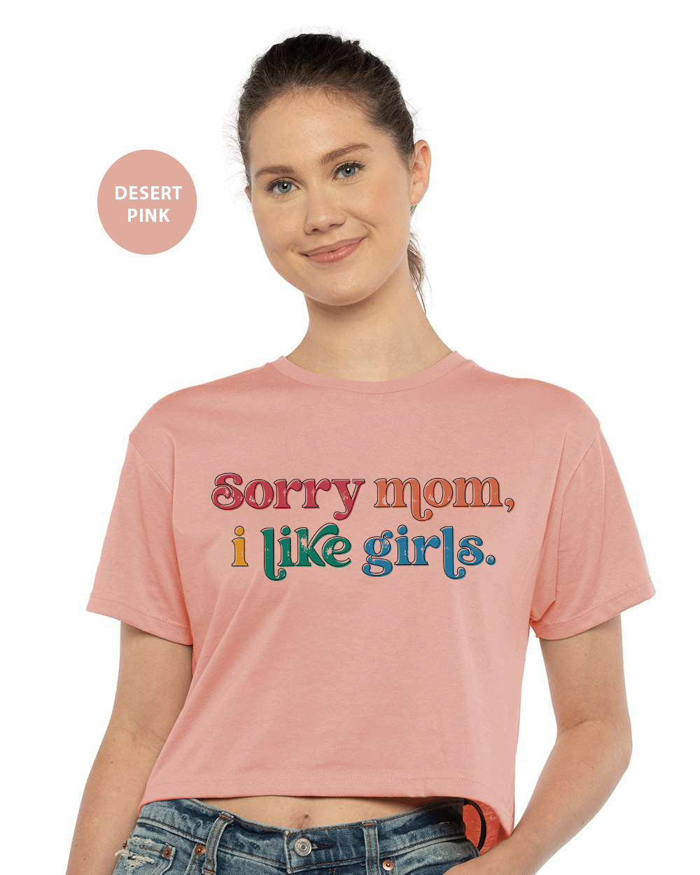 a woman wearing a pink shirt that says sorry mom, i like girls