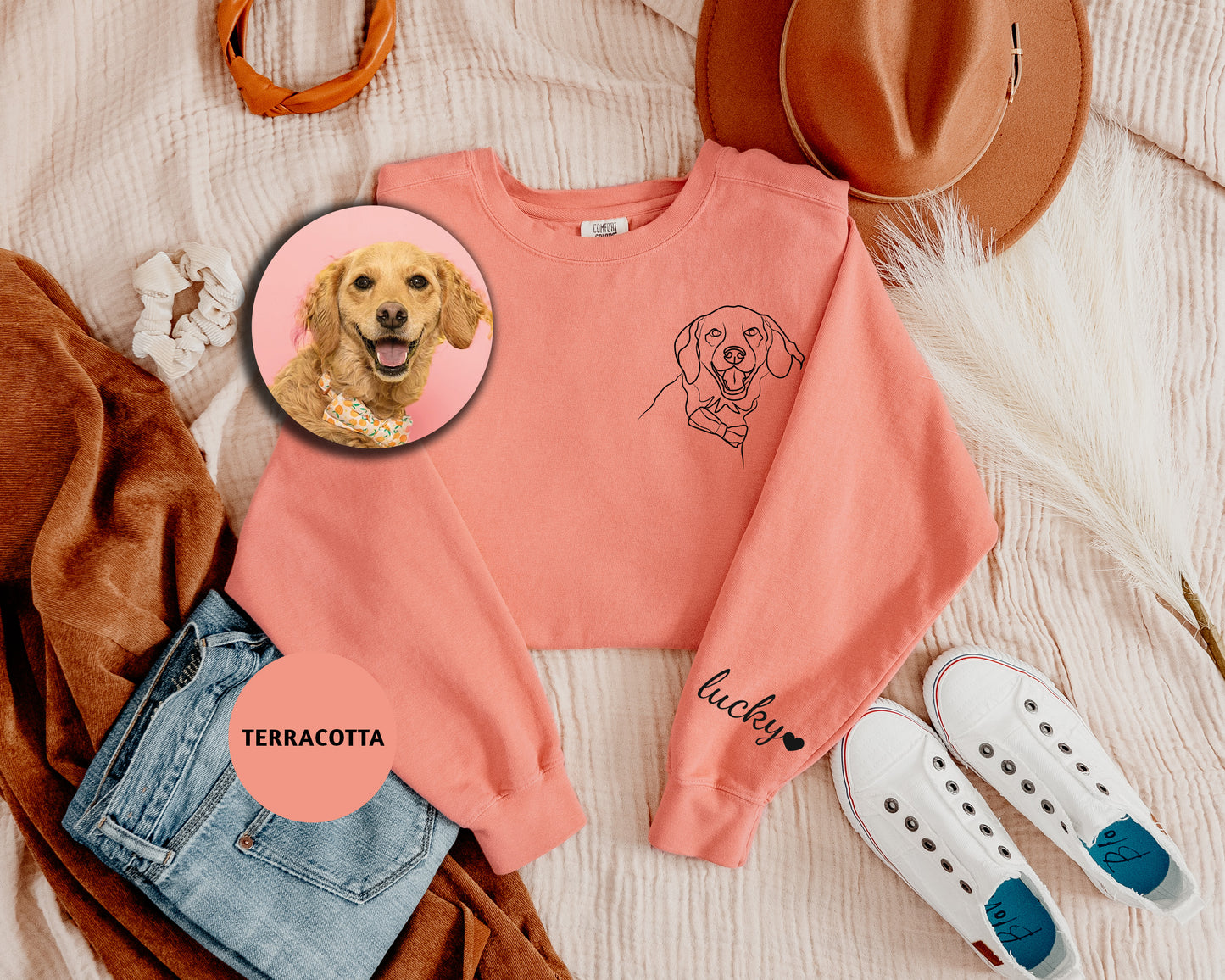 a pink shirt with a picture of a dog on it