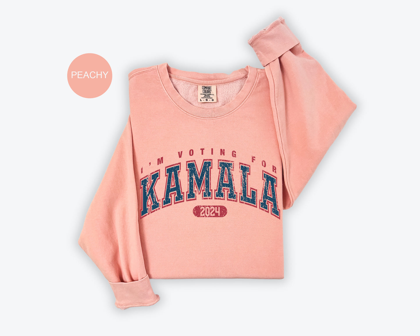 a pink sweatshirt with the word kalamala printed on it