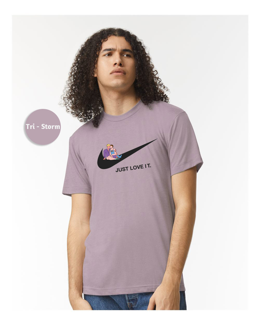 a man wearing a purple nike t - shirt with the words just love it