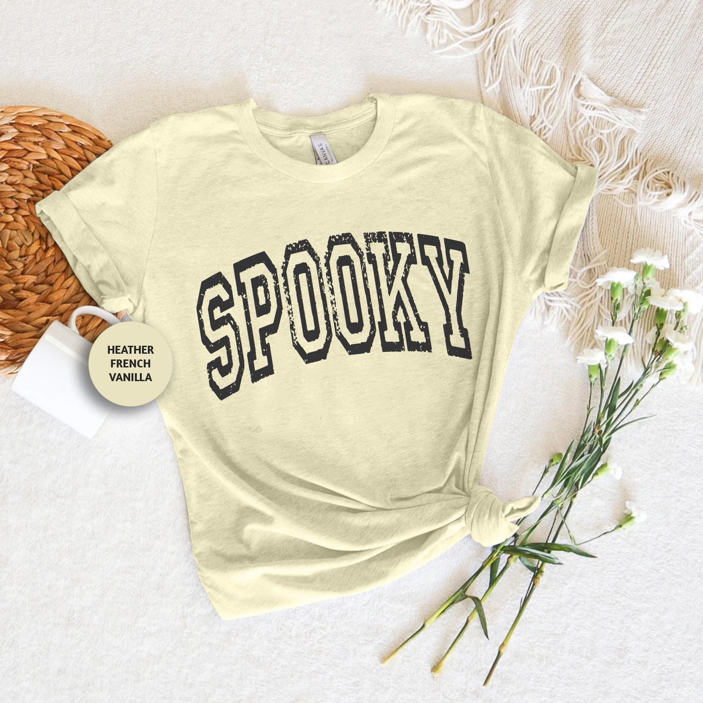 a t - shirt with the word spooky printed on it