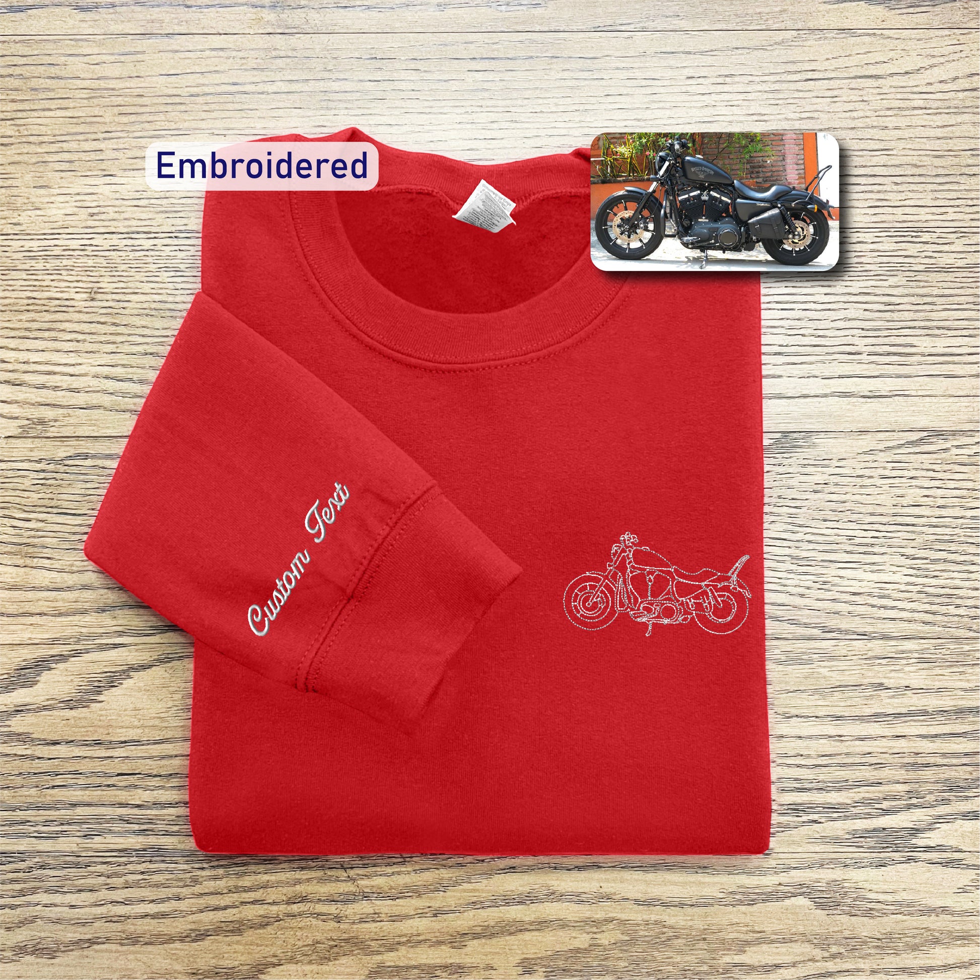 a red shirt with a picture of a motorcycle on it