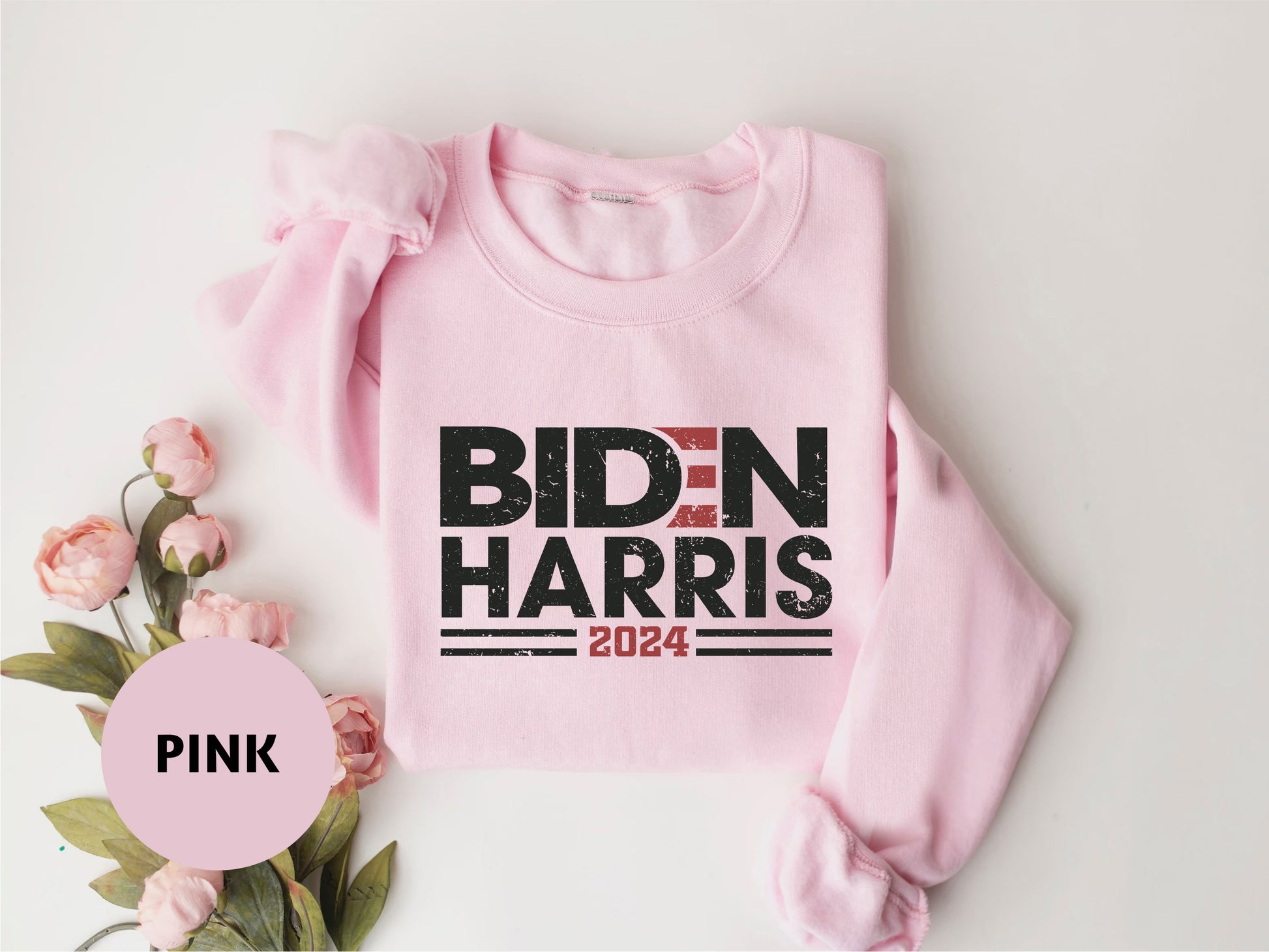 a pink sweatshirt with the words bidn harris on it