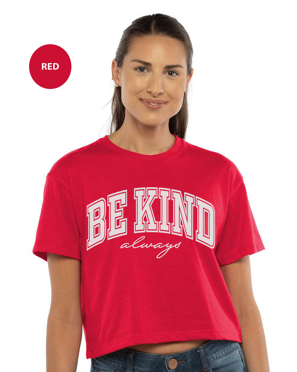 a woman wearing a red shirt with the words be kind on it