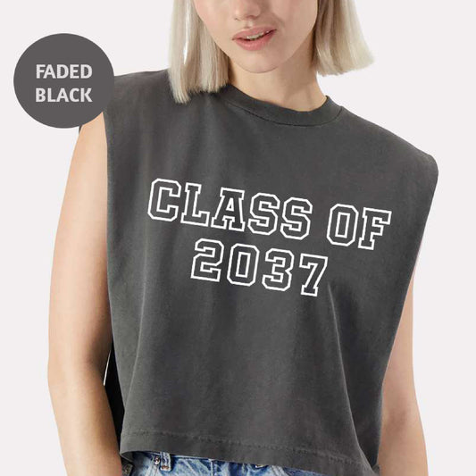 a woman with blonde hair wearing a black shirt that says class of 2097