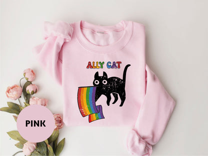 a pink shirt with a black cat on it