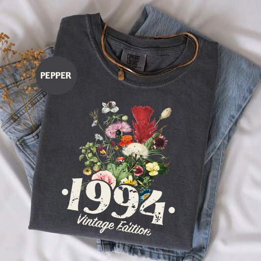 a t - shirt with a picture of a bouquet of flowers on it