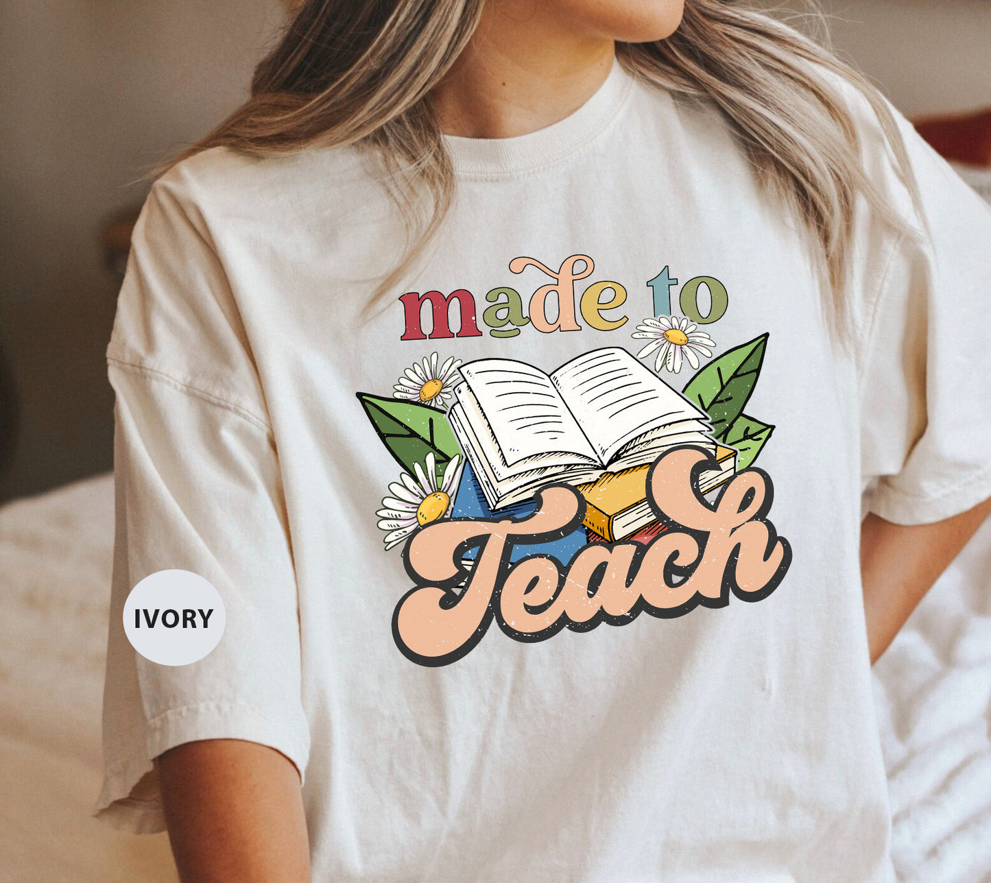 a girl wearing a made to teach t - shirt