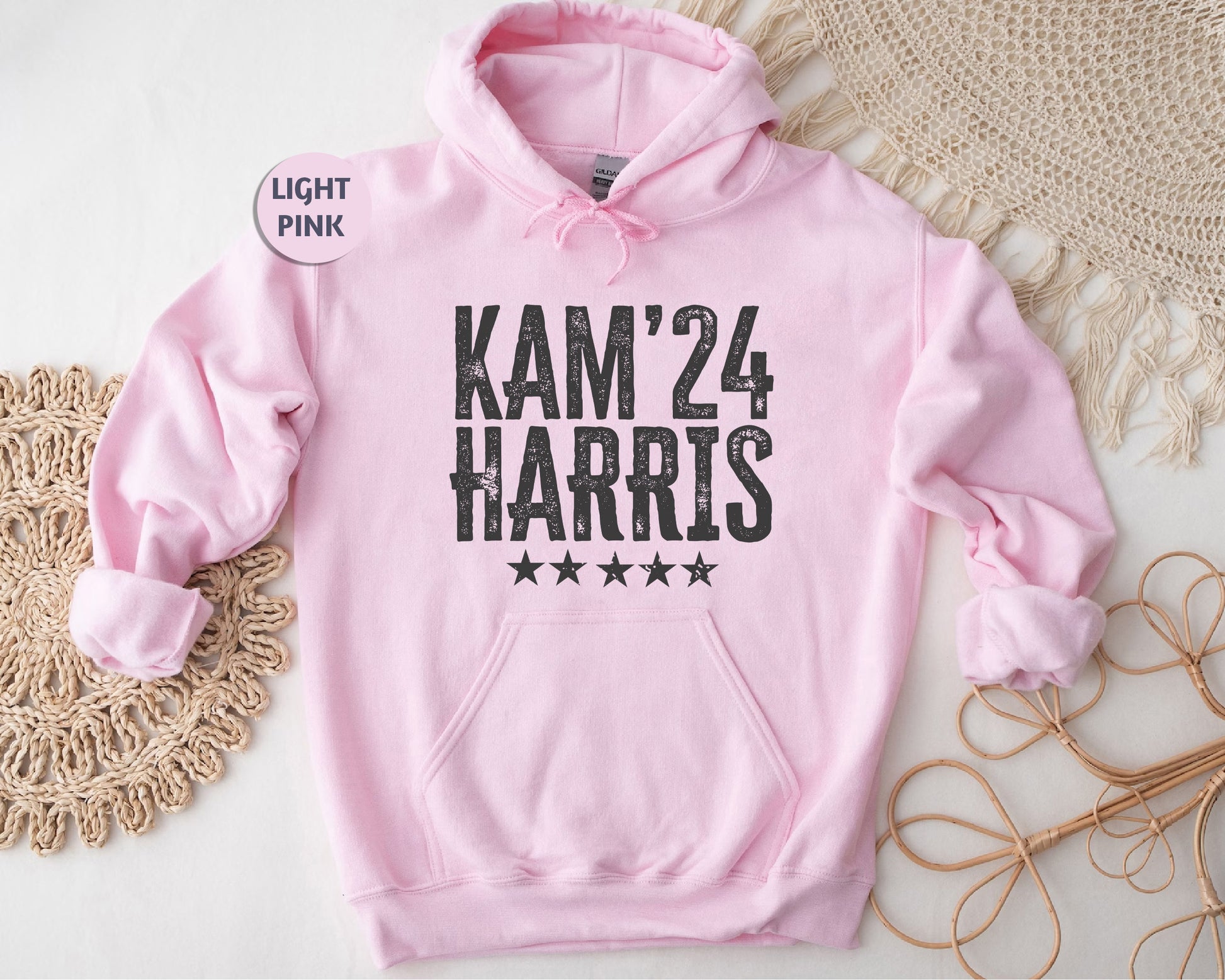 a pink hoodie with the words kam'24 harris printed on it