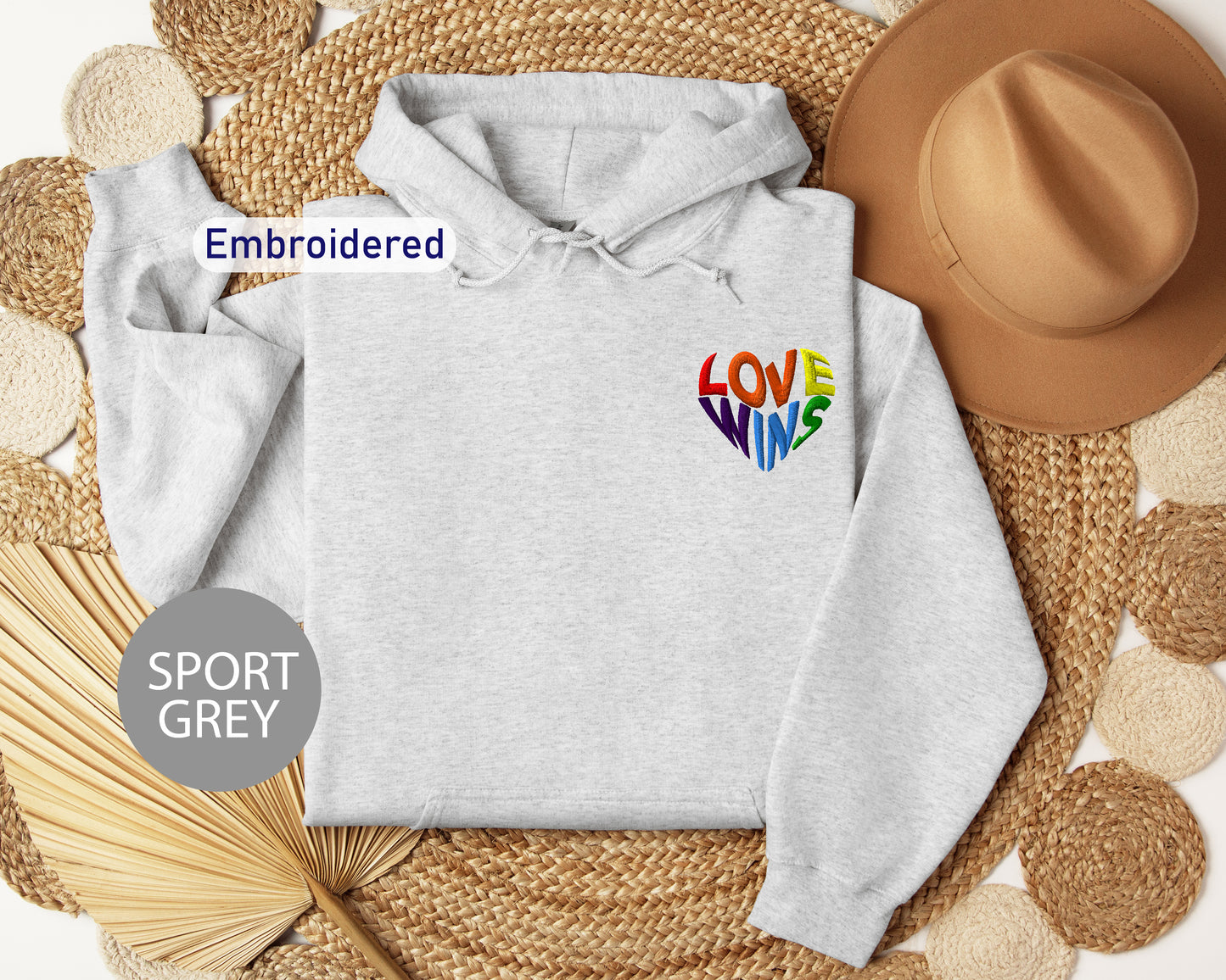 a white hoodie with the word love on it