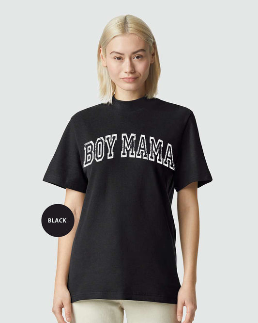 a woman wearing a black shirt with the word boy mama printed on it