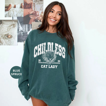 a woman in a green sweatshirt posing for a picture