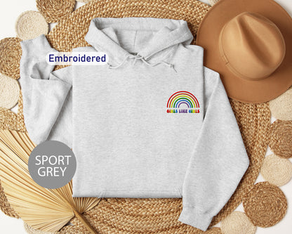 a white hoodie with a rainbow embroidered on it