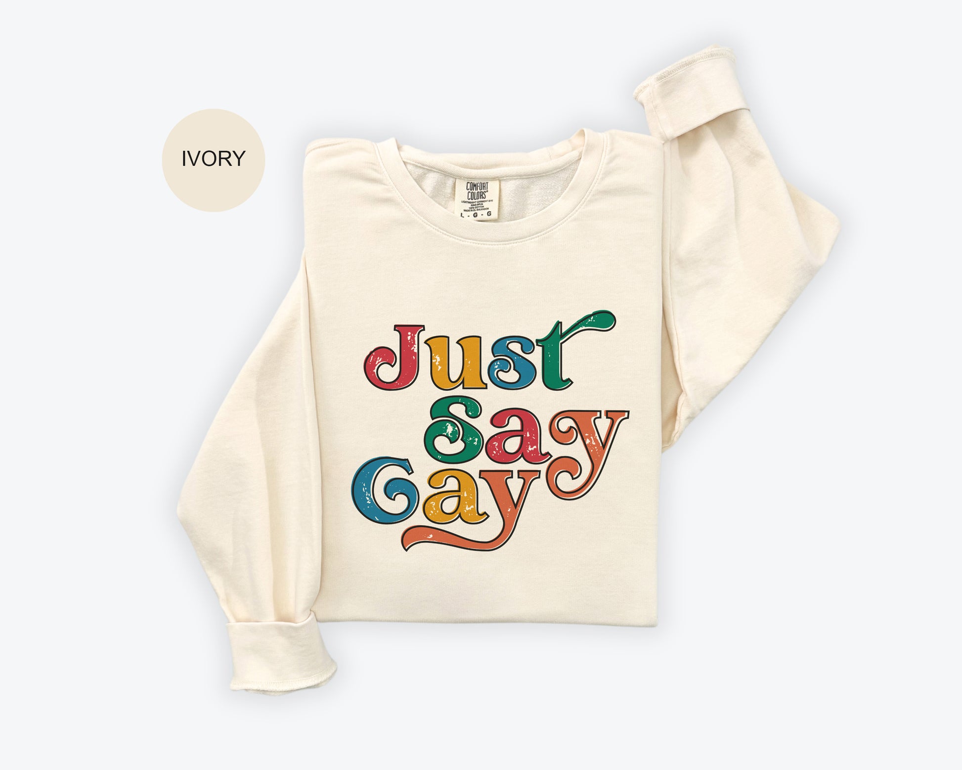 a t - shirt with the words just gay gay printed on it