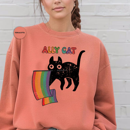 a woman wearing a sweatshirt with a cat on it