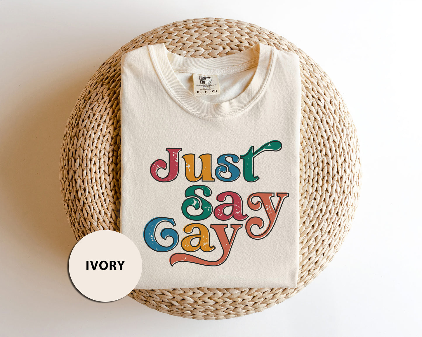 a t - shirt with the words just say gay printed on it