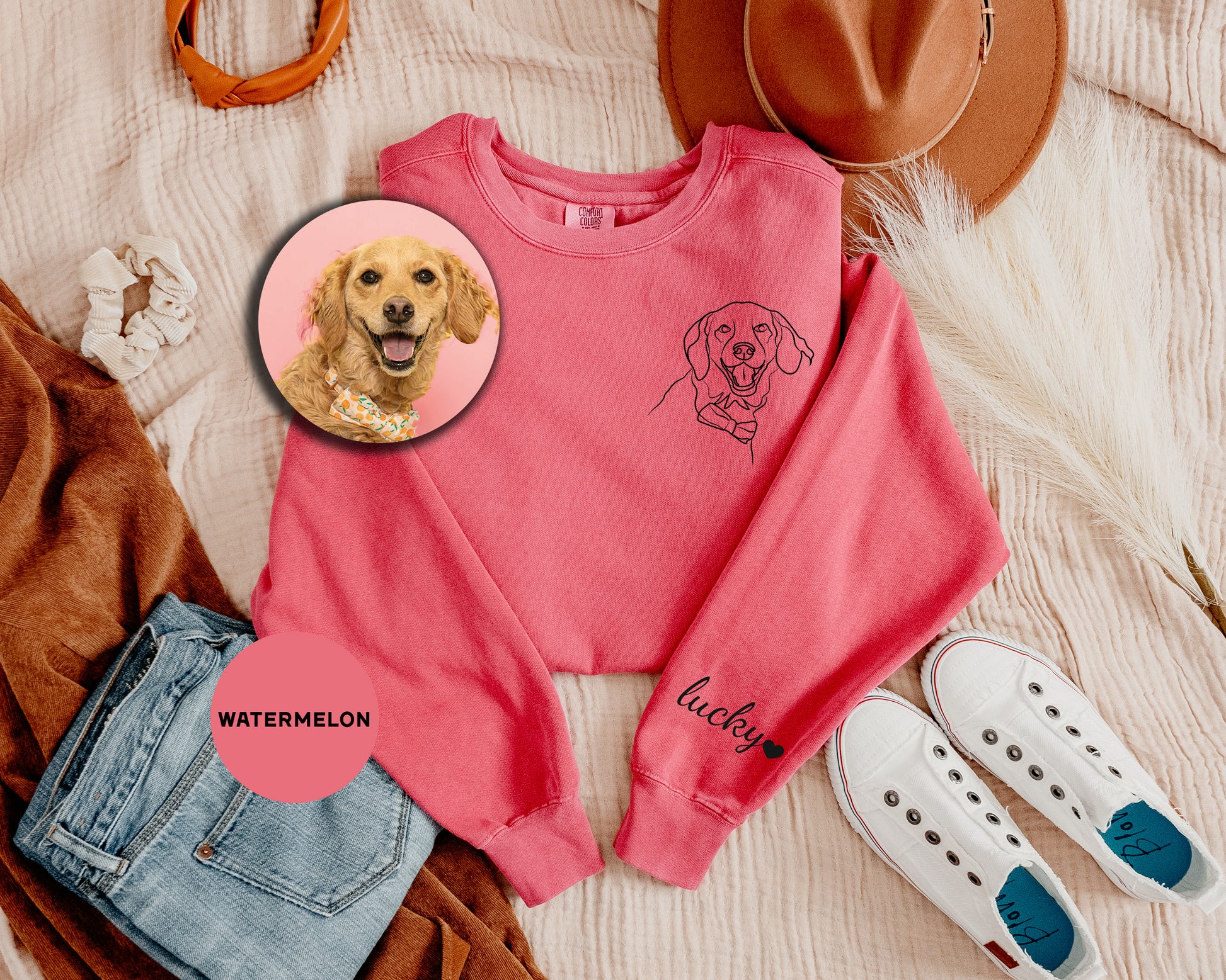 a pink shirt with a picture of a dog on it