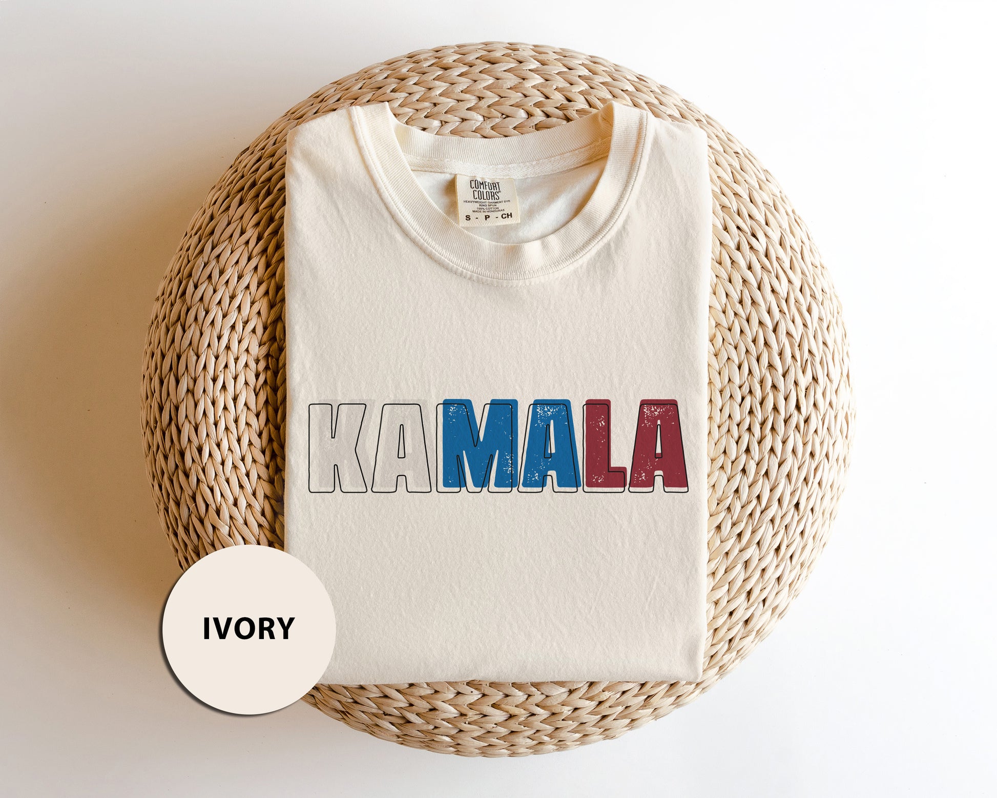 a white t - shirt with the word kalaala printed on it