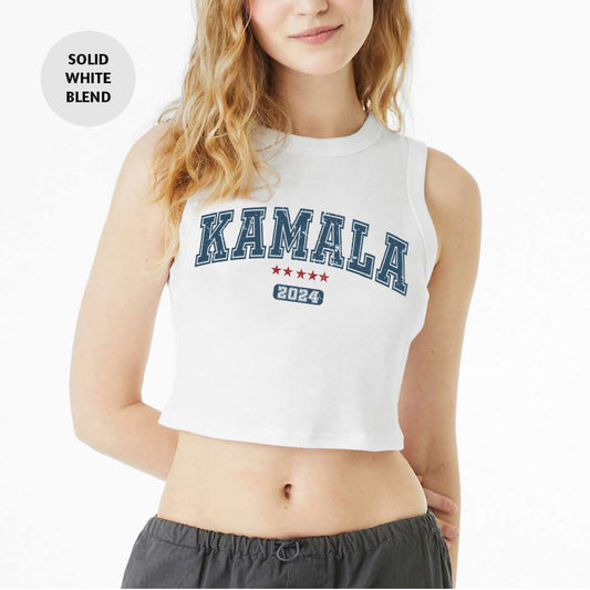 a woman wearing a white crop top with the word kansas printed on it