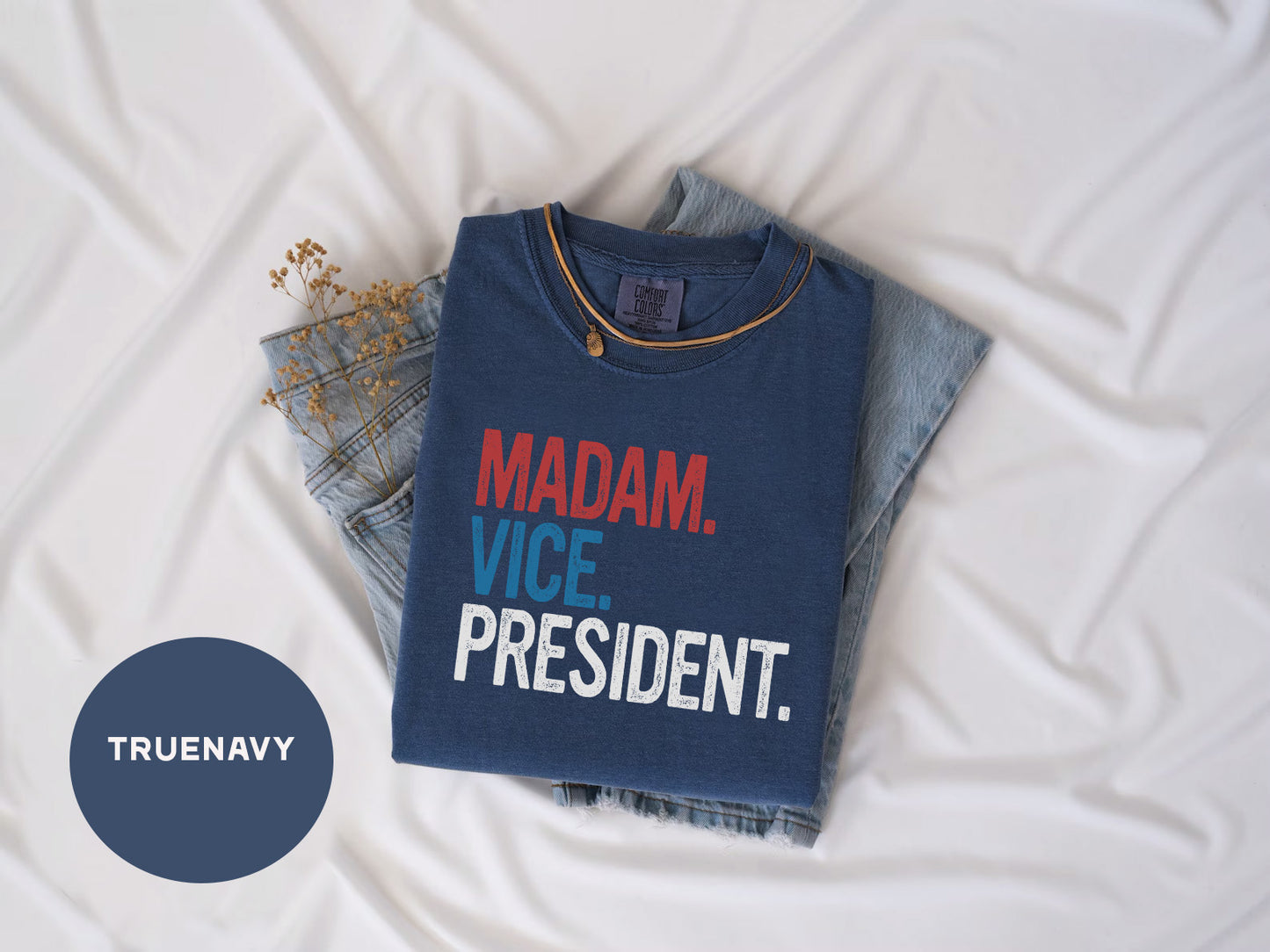 a blue shirt that says madam vice president