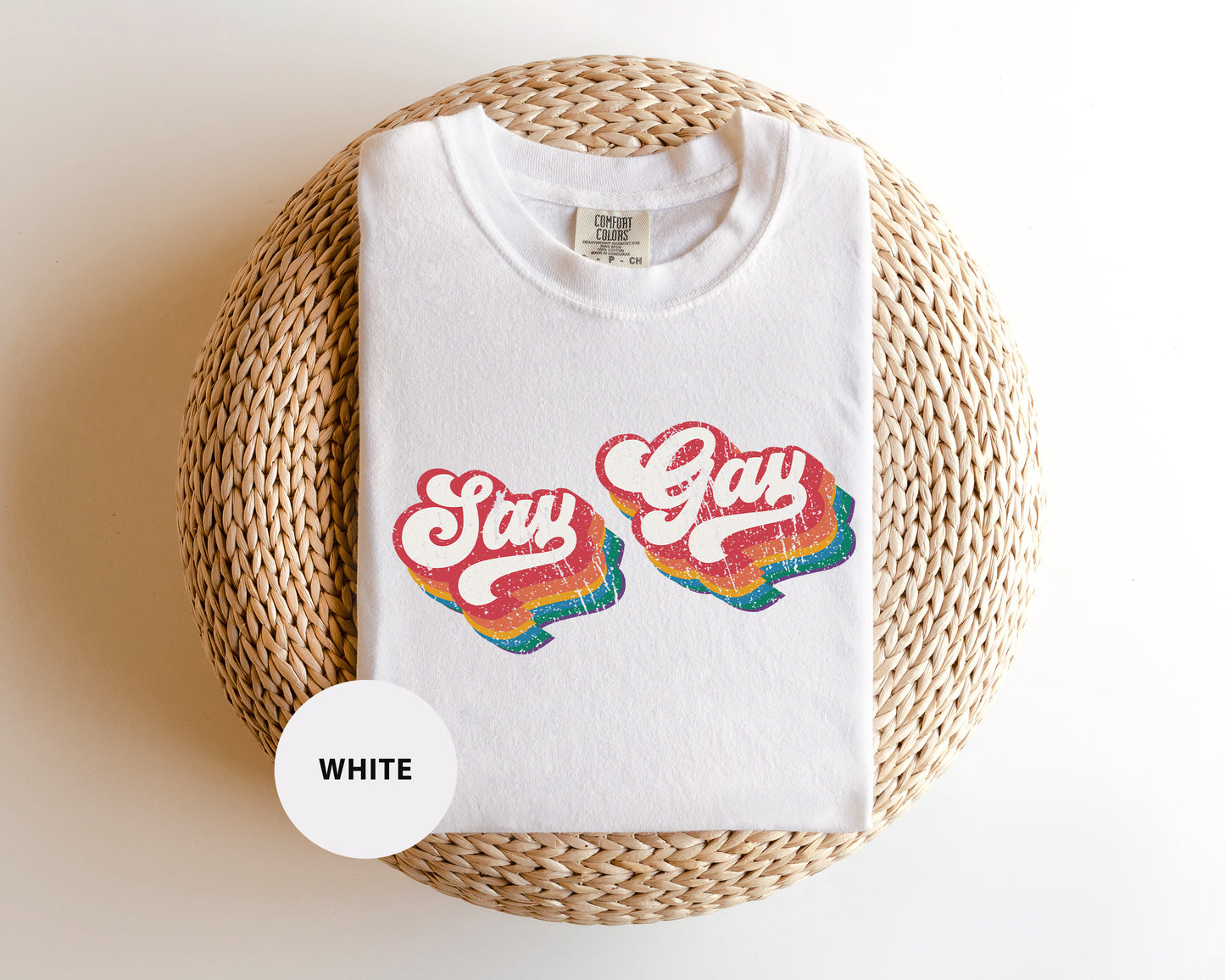 a white t - shirt with the words stay gay on it