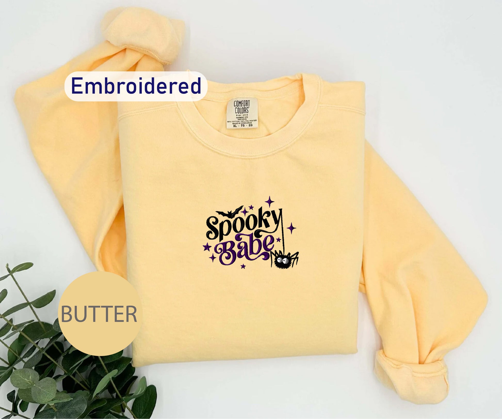 a yellow sweatshirt with the words spooky spot on it