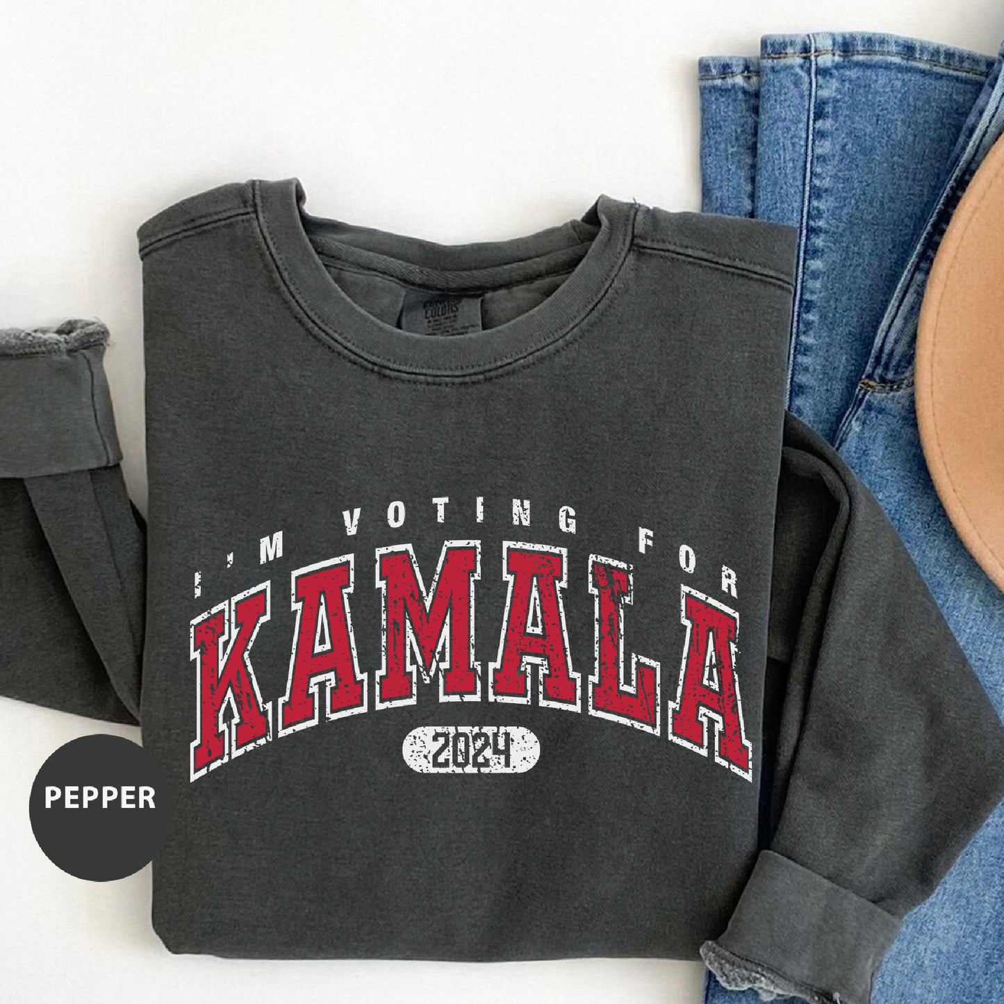 a pair of jeans and a sweatshirt with the words, i'm voting for