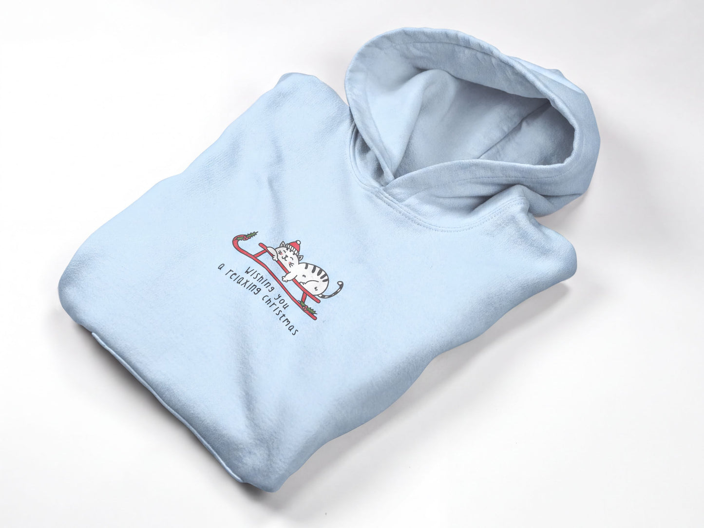 A light blue hoodie with a cat graphic and text printed on it.