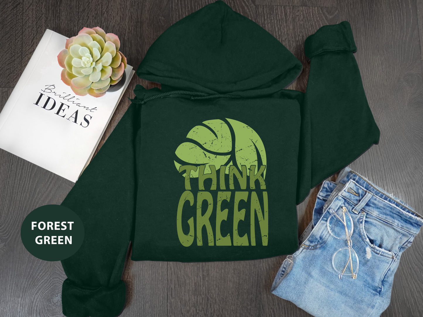 a green hoodie with the words think green on it