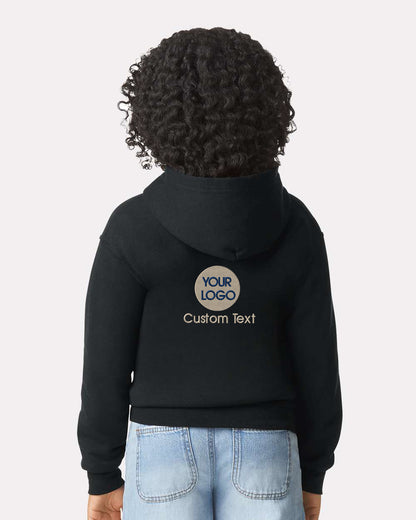 a child wearing a black hoodie with a custom text