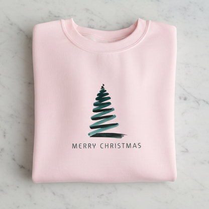 A pink sweatshirt with a Christmas tree graphic and the text "MERRY CHRISTMAS" printed on it.