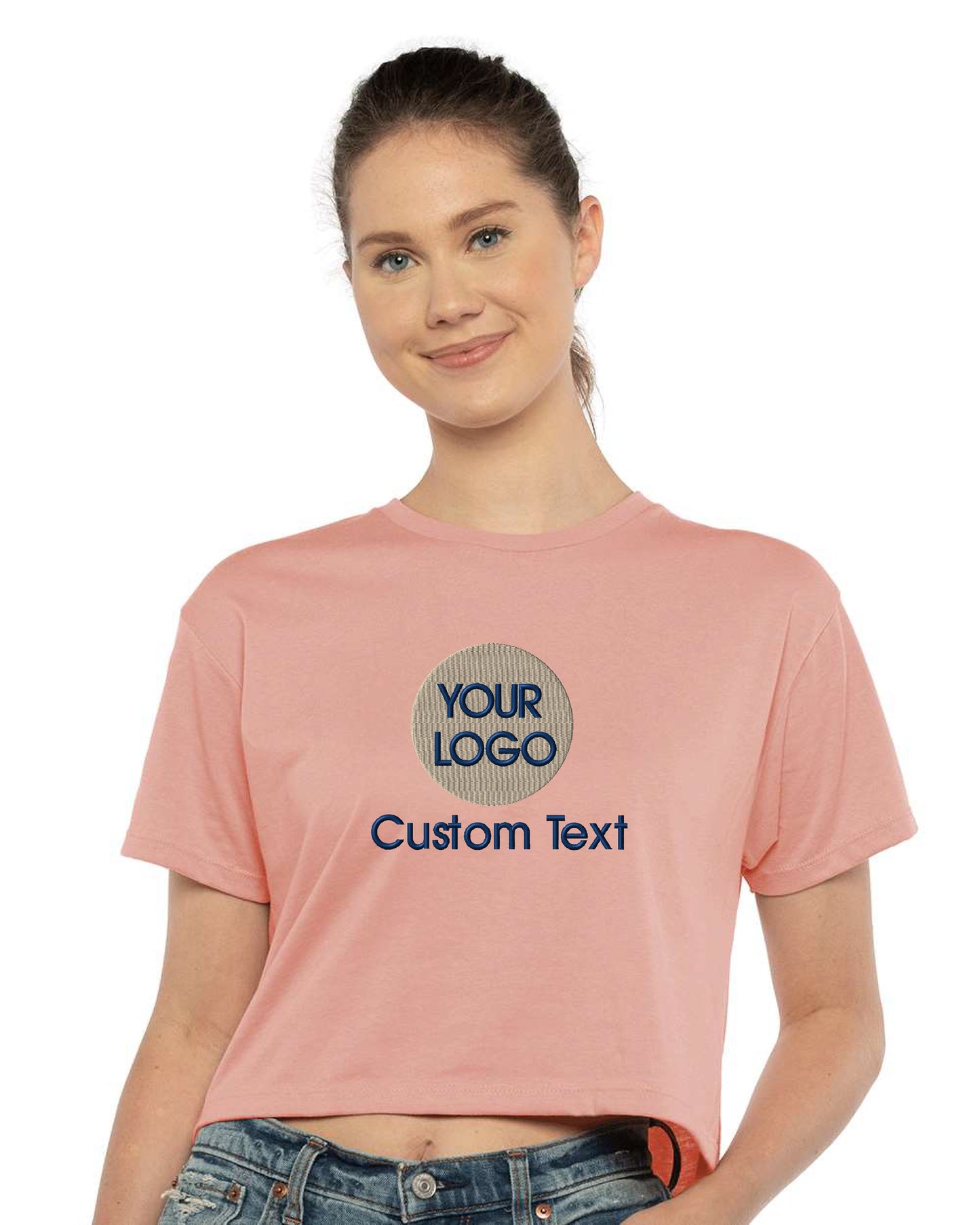 a woman wearing a pink t - shirt with the words your logo on it