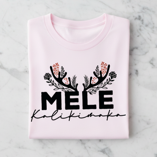 A pink t-shirt with the text "MELE Kalikinaka" printed on it, along with decorative floral elements.