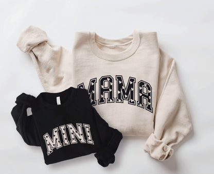 two sweatshirts with the word mama on them