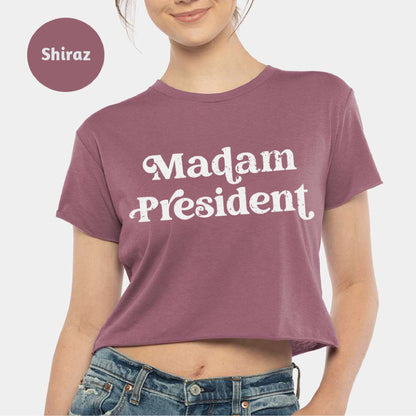 a woman wearing a shirt that says madam president