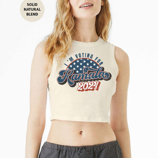 a woman wearing a crop top that says i am voting for kansas