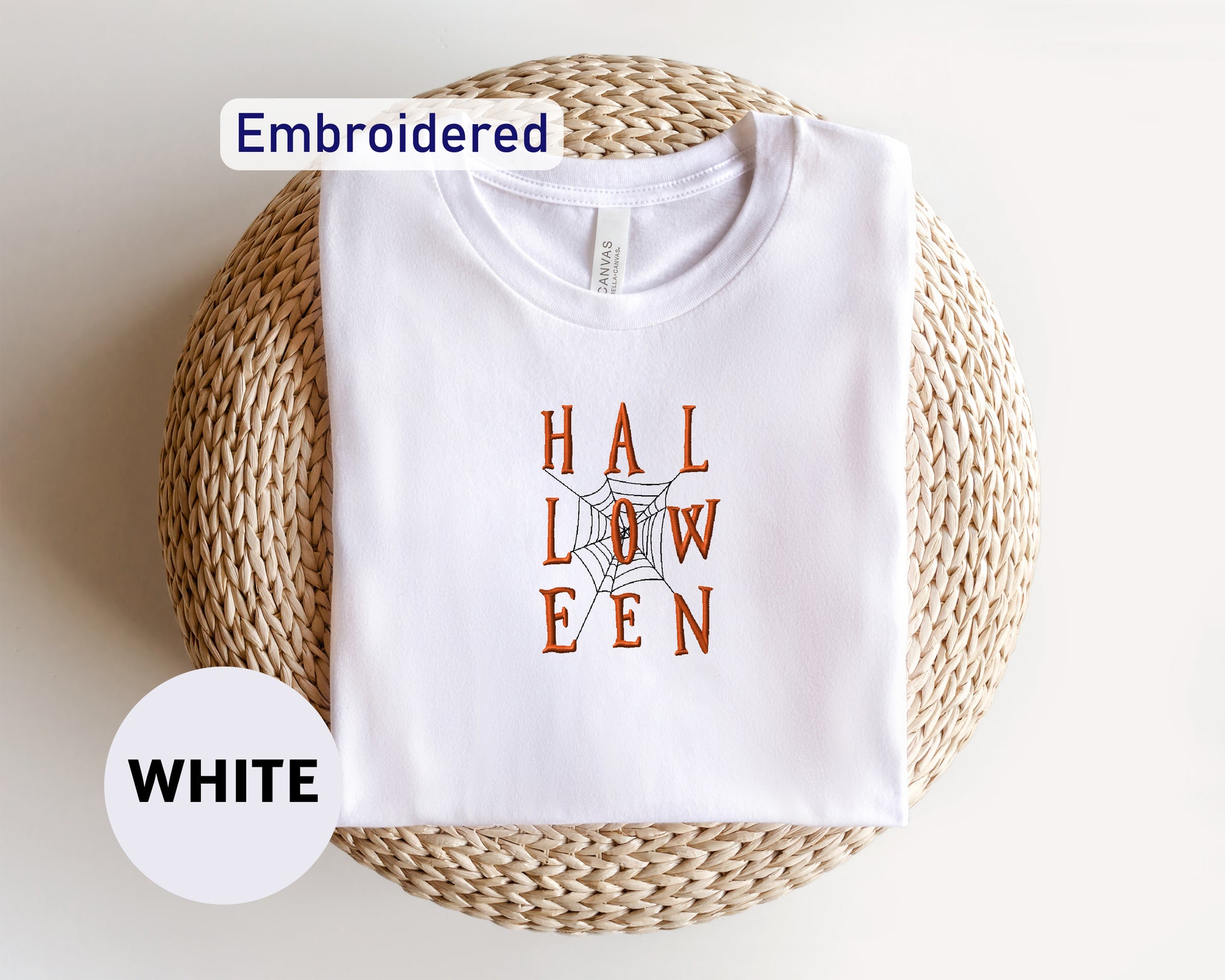 a white t - shirt with the words halloween written on it