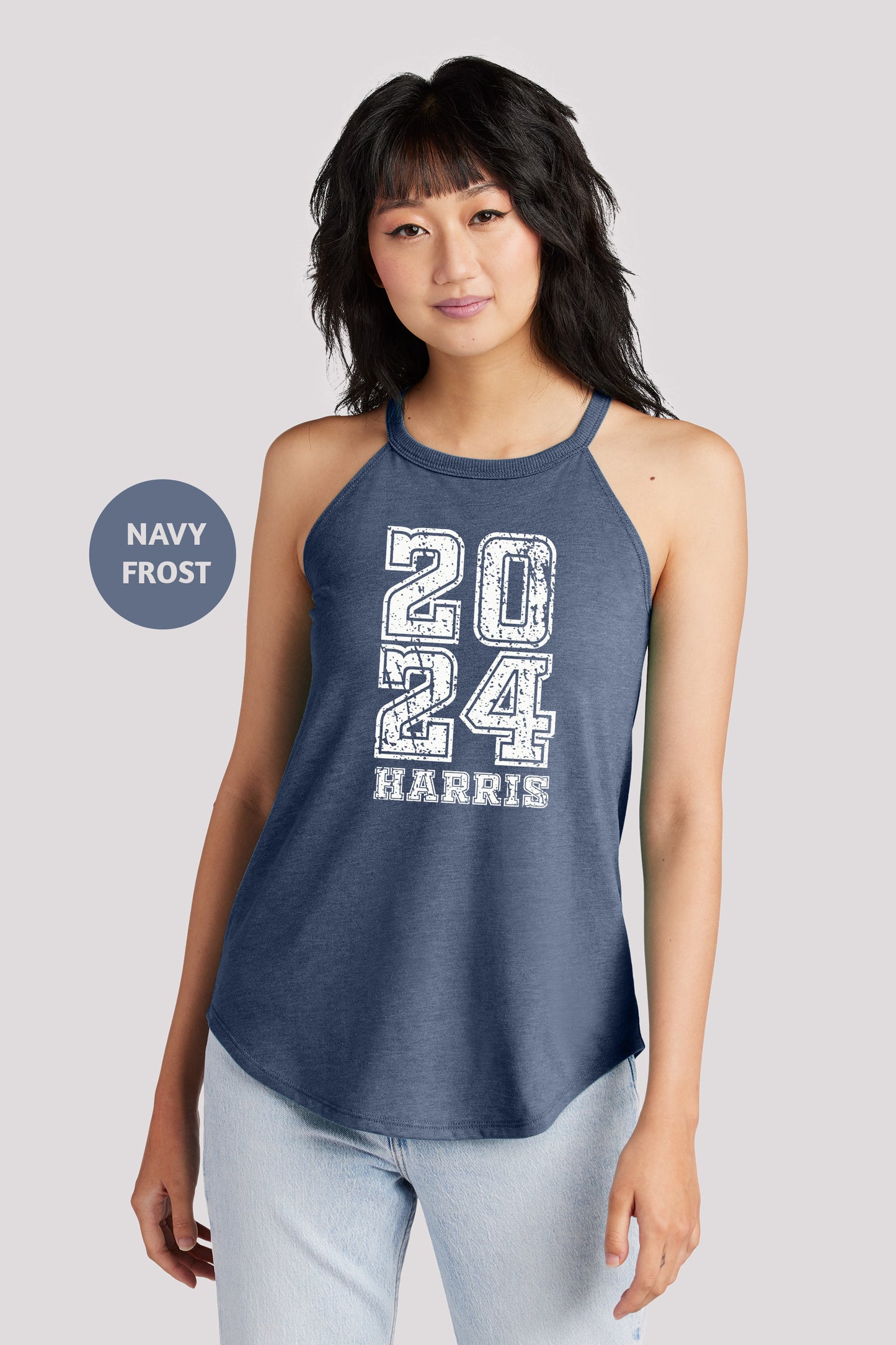 a woman wearing a navy tank top that says navy frost