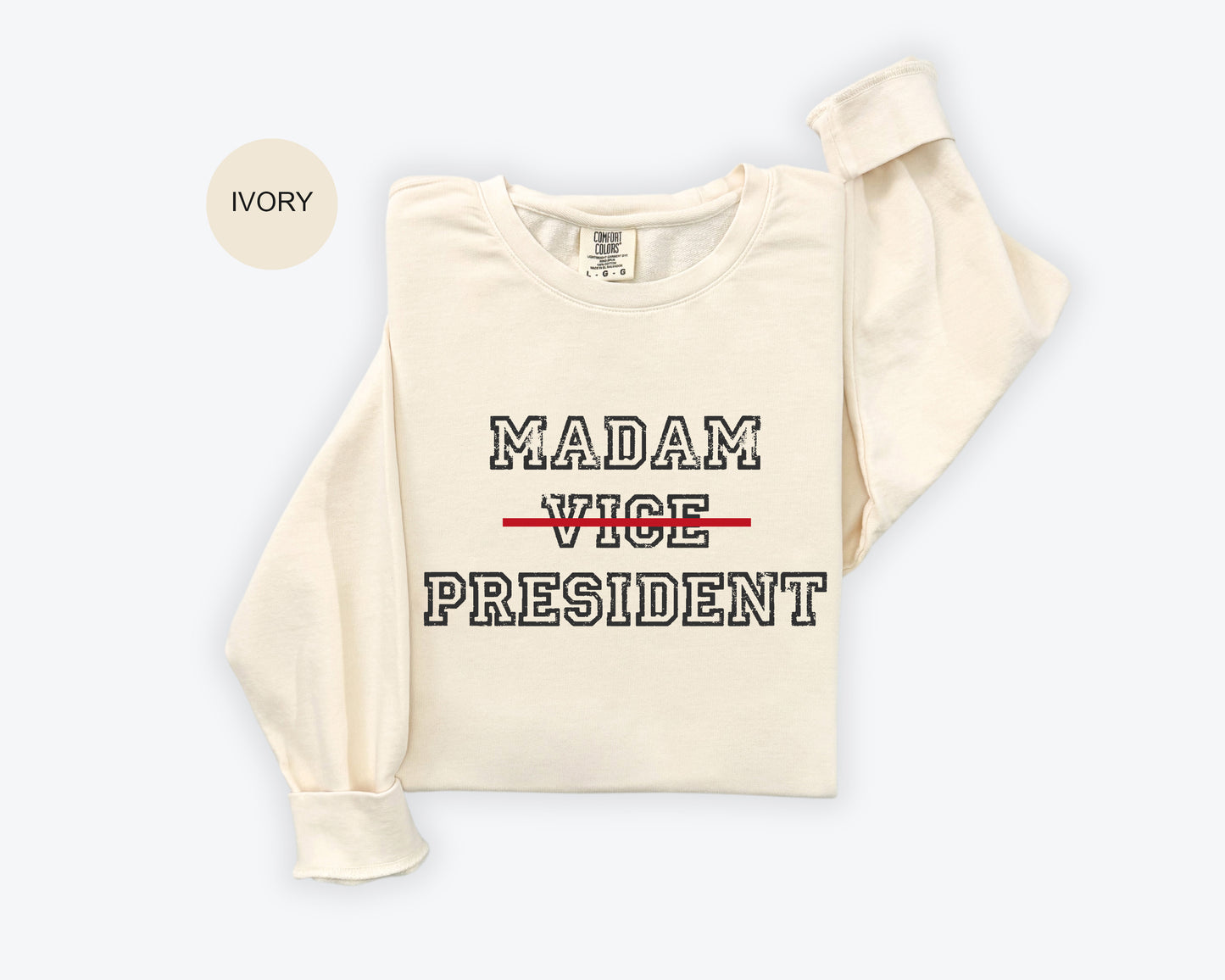 a white sweatshirt with the words madam vice president printed on it