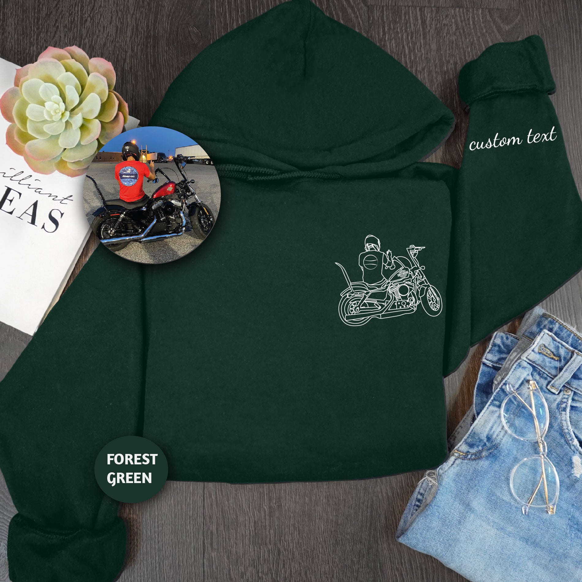 a green hoodie with a picture of a motorcycle on it