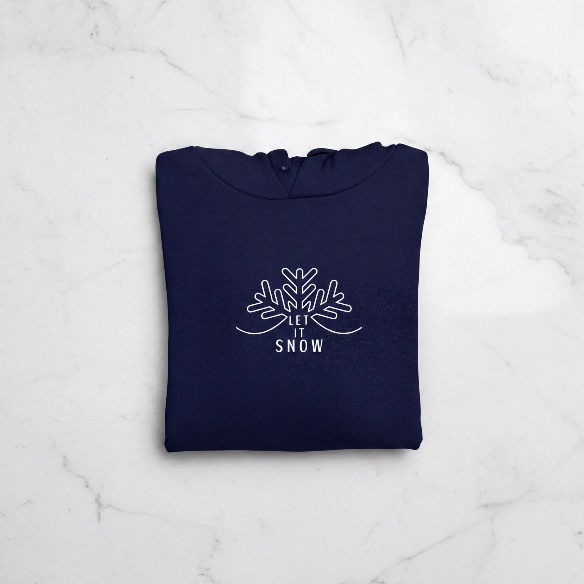 A navy blue hoodie with a white snowflake design and the text "LET IT SNOW" printed on it.