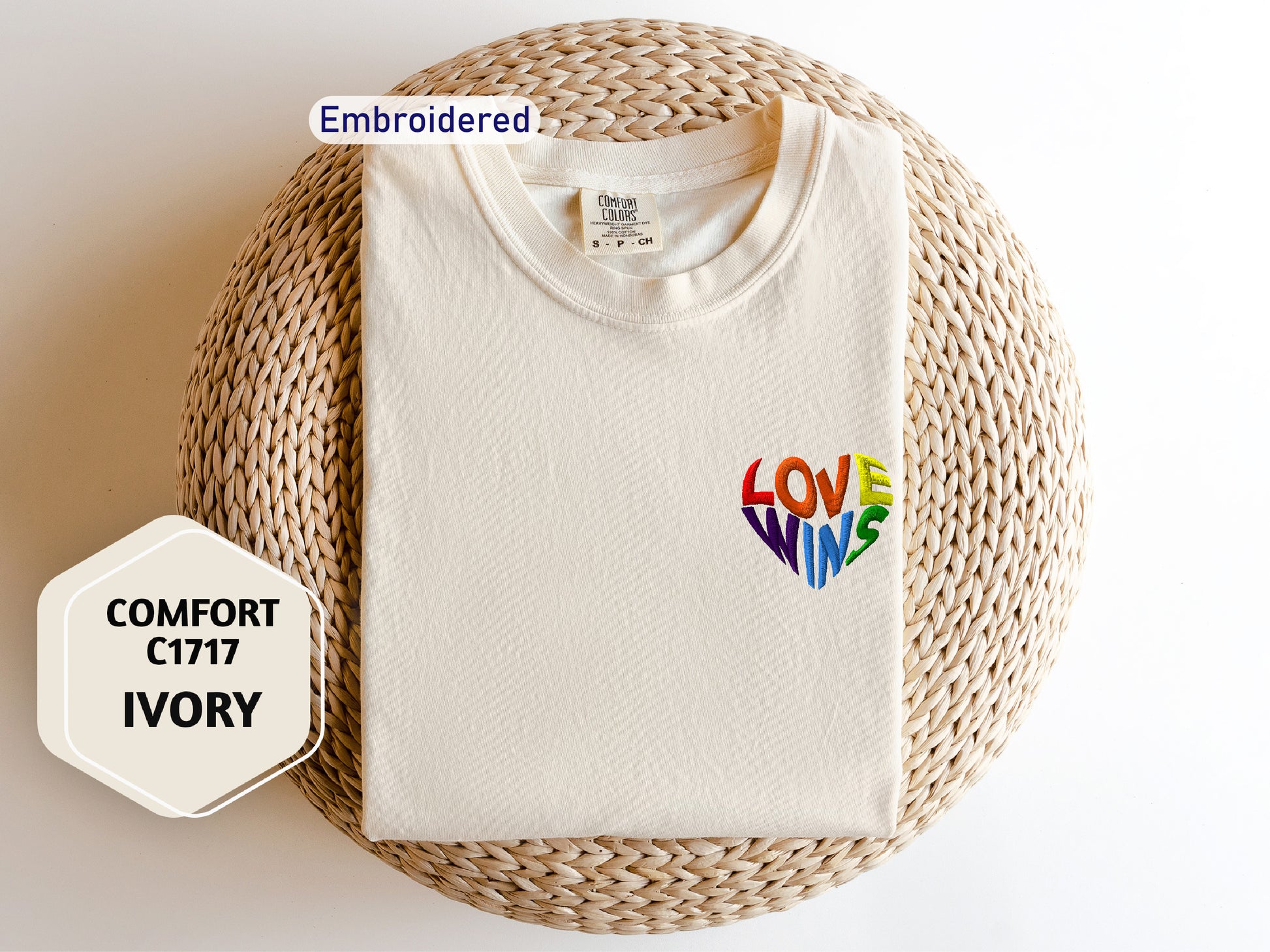 a t - shirt with the words love wins printed on it