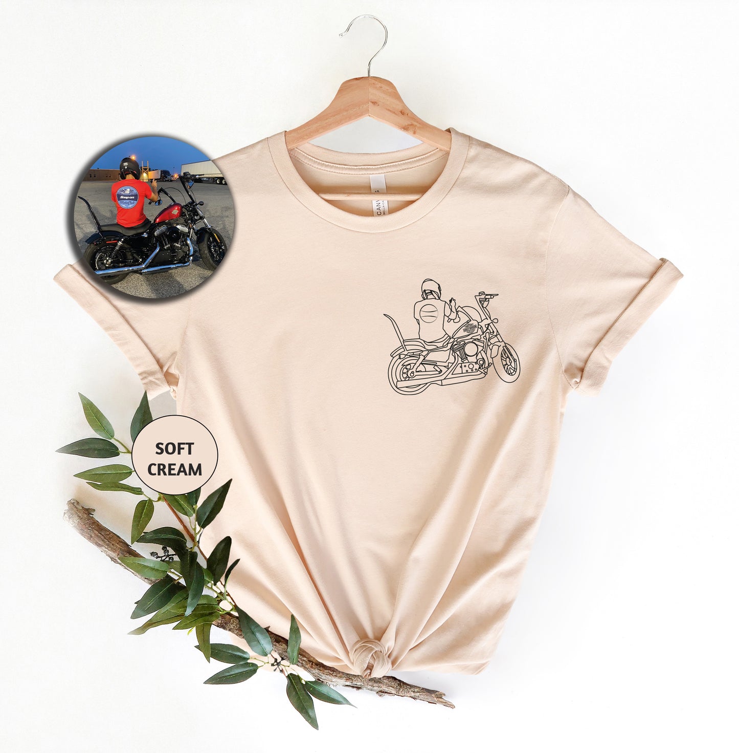 a t - shirt with a picture of a man riding a motorcycle