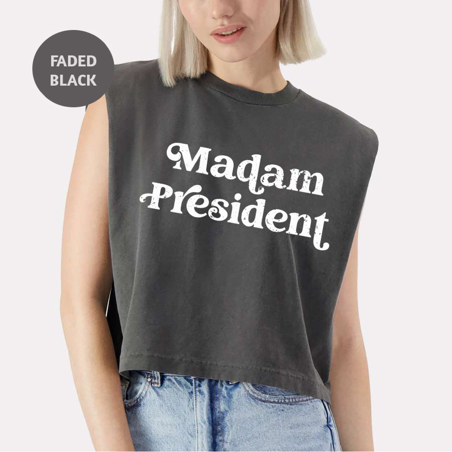 a woman wearing a crop top that says madam president