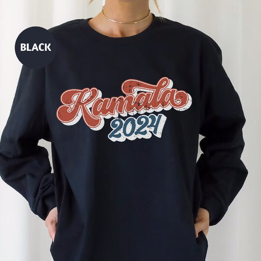 a woman wearing a black sweatshirt with the words kansas on it