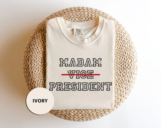 a white t - shirt with the words madam vice president printed on it